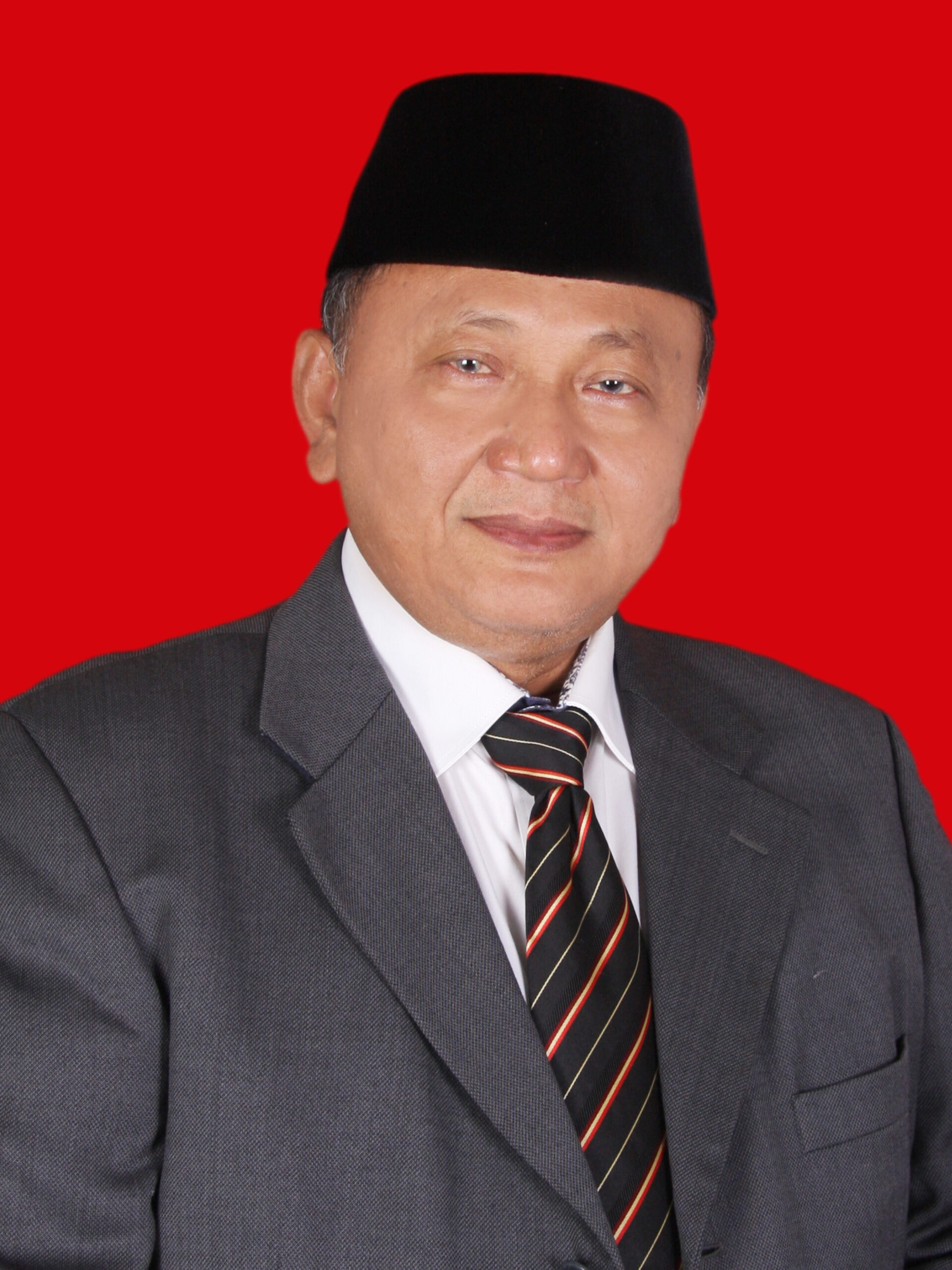 Dr. HENDRI TUMBUR SIMAMORA, SE., M.Si
